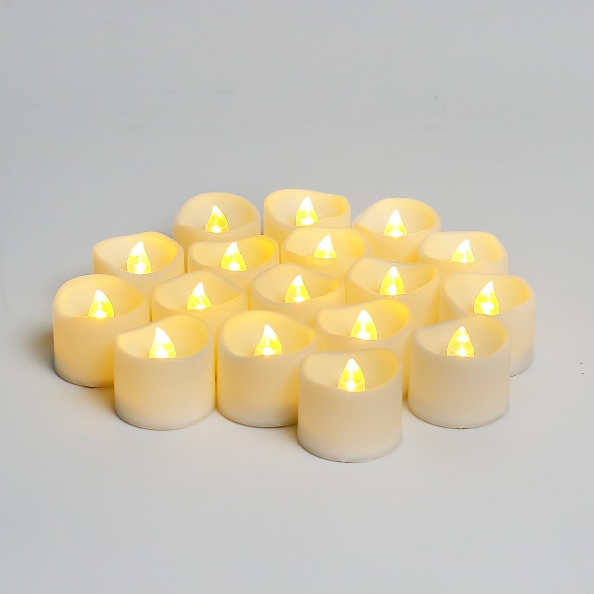 Battery Tea lIghts Candles (24 Pack) - Warm White Realistic and Bright Flickering Battery Operated Tea Lights Candles - Beautiful Flamlessless LED tea lights for Home Decor - Wave Design Fake Candles